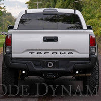 דיודה Dynamics 16-21 Toyota Tacoma Stage Series רתמת חיווט אור הפוך