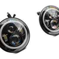 Raxiom 97-18 ג'יפ רנגלר TJ/JK צירי 7 אינץ' פנסי LED עם RGB Halo- Blk Hsng (עדשה שקופה)